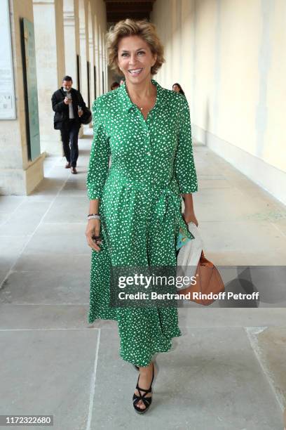 Actress Corinne Touzet attends the "Tosca - Opera en Plein Air" performance at Les Invalides on September 04, 2019 in Paris, France.