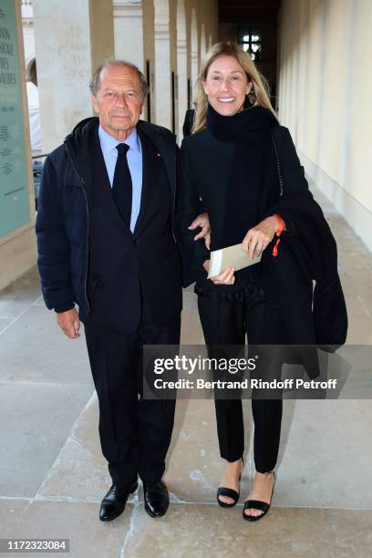 Jean-Claude Meyer and his wife Nathalie Bloch-Laine attend the "Tosca - Opera en Plein Air" performance at Les Invalides on September 04, 2019 in...