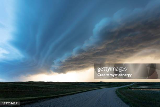 prairie storm saskatchewan canada - mammatus cloud stock pictures, royalty-free photos & images