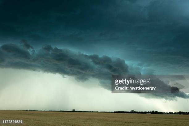 prairie storm saskatchewan canada - prairie stock pictures, royalty-free photos & images