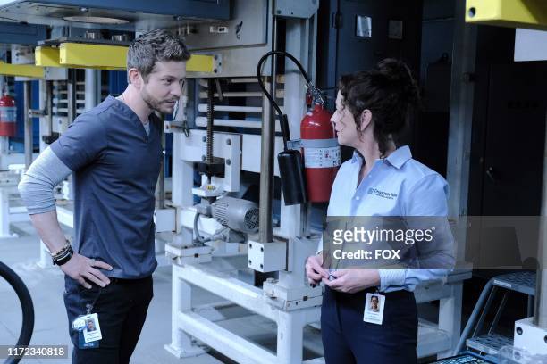 Matt Czuchry and guest star Moira Kelly in the "From the Ashes" season premiere episode of THE RESIDENT airing Tuesday, Sept. 24 on FOX.