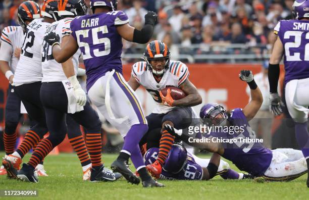 Chicago Bears running back David Montgomery carries the ball in the third quarter against the Minnesota Vikings at Soldier Field in Chicago on...