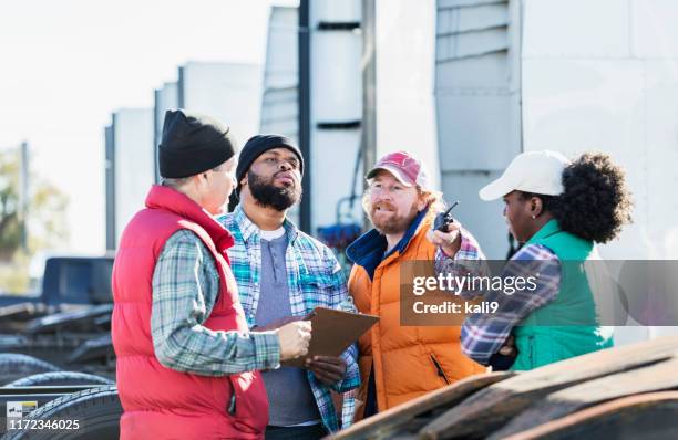 workers at trucking company having meeting - fleet manager stock pictures, royalty-free photos & images