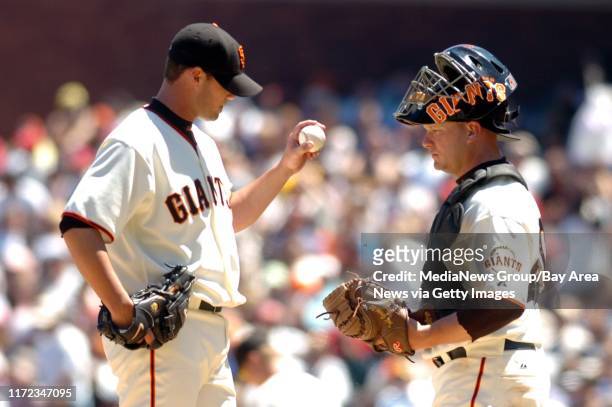 The San Francisco Giants starting pitcher Noah Lowry leaves the game with the bases loaded in the 4th inning, relinquishing the ball to catcher Todd...