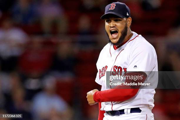 Eduardo Rodriguez of the Boston Red Sox celebrates after pitching the seventh inning against the Minnesota Twins at Fenway Park on September 04, 2019...