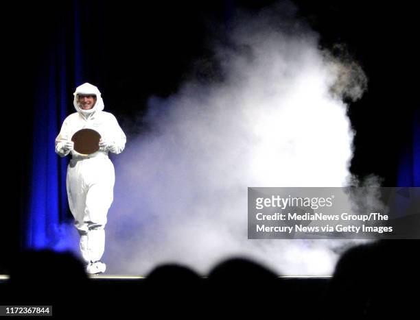Intel's CEO Paul Otellini arrived in a clean room bunny suit to help Jobs announce Intel's participation in the next generation om Macs, starting...