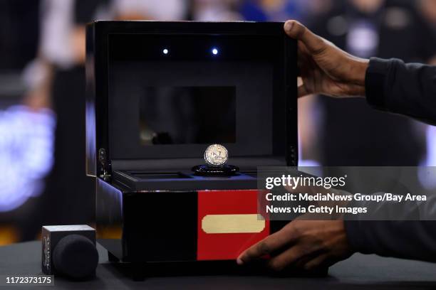 Former Golden State Warriors player Ian Clark, who now plays for the New Orleans Pelicans, receives his championship ring during a pregame ceremony...