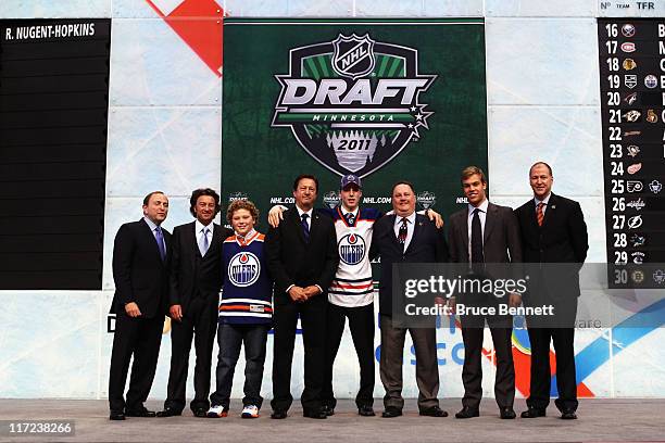 Commissioner Gary Bettman , General Manager Steve Tambellini , first overall pick Ryan Nugent-Hopkins by the Edmonton Oilers, Taylor Hall and...