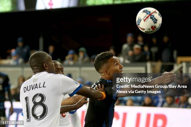 San Jose Earthquakes' Danny Hoesen tries to control the ball against Montreal Impact's Chris Duvall in the second half of their MLS season opener at...