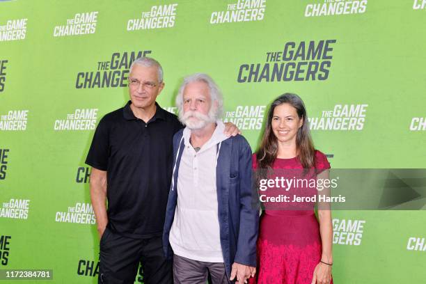 Louie Psihoyos, Bob Weir and Natascha Muenter arrive at the LA Premiere of 'The Game Changers' at ArcLight Hollywood on September 04, 2019 in...