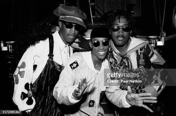 Portrait of the members of American R&B group Tony Toni Tone as they pose backstage at the Marcus Amphitheater, Milwaukee, Wisconsin, July 3, 1991....