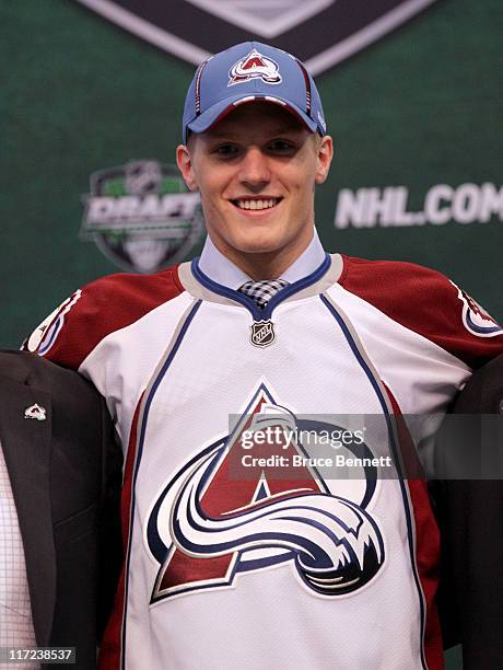Second overall pick Gabriel Landeskog by the Colorado Avalanche stands on the podium for a photo during day one of the 2011 NHL Entry Draft at Xcel...