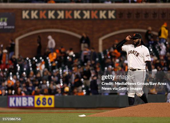 San Francisco Giants starting pitcher Johnny Cueto walks below his ...