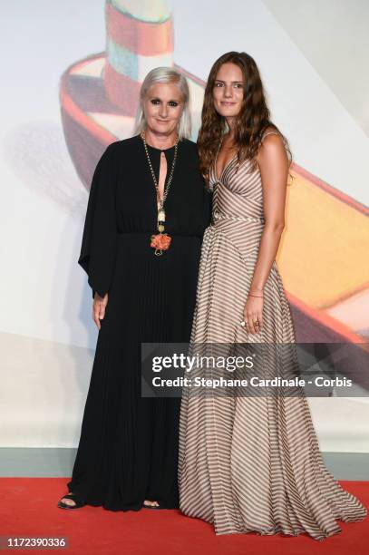 Maria Grazia Chiuri and Rachele Regini walk the red carpet ahead of the "Chiara Ferragni - Unposted" screening during the 76th Venice Film Festival...