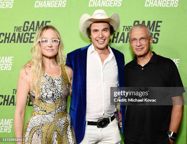 Christiana Wyly, Kimbal Musk and Director Louie Psihoyos attend the Los Angeles Premiere of "The Game Changers" Documentary at ArcLight Hollywood on...