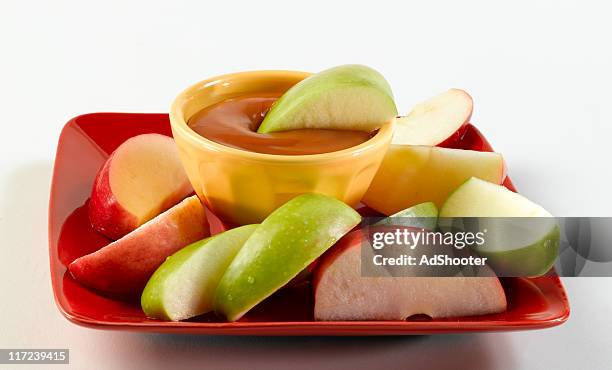 caramelo manzanas - salsa espesa fotografías e imágenes de stock