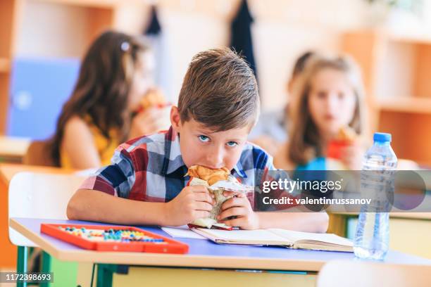 junk food in school - school breakfast stock pictures, royalty-free photos & images