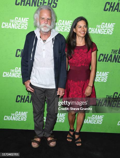 Bob Weir and Natascha Muenter arrives at the LA Premiere Of "The Game Changers" at ArcLight Hollywood on September 04, 2019 in Hollywood, California.