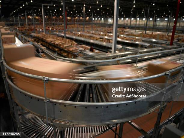 conveyor system - boxes on conveyor belt stock pictures, royalty-free photos & images