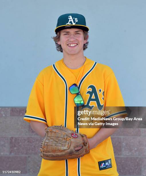 Oakland Athletics fan Cole Santos of Danville, a senior at Monte Vista High School, has his photo taken wearing his Yoenis Cespedes jersey during an...