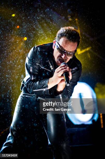 Bono of U2 performs live on the pyramid stage during the Glastonbury Festival at Worthy Farm, Pilton on June 24, 2011 in Glastonbury, England.