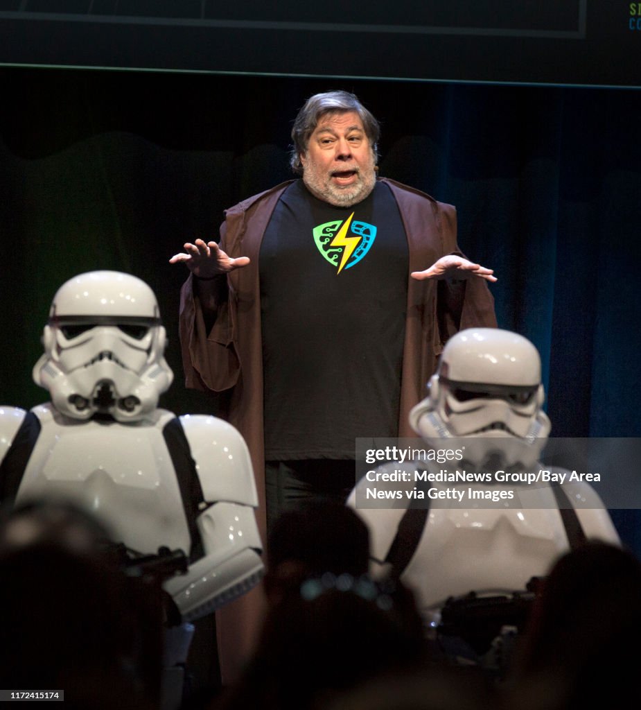 Apple co-founder Steve Wozniak addresses the crowd while being guarded by "Star Wars" Stormtroopers during the inaugural Silicon Valley Comic Con, founded by Wozniak, at the San Jose McEnery Convention Center in San Jose, Calif., Saturday, March 18, 2016.