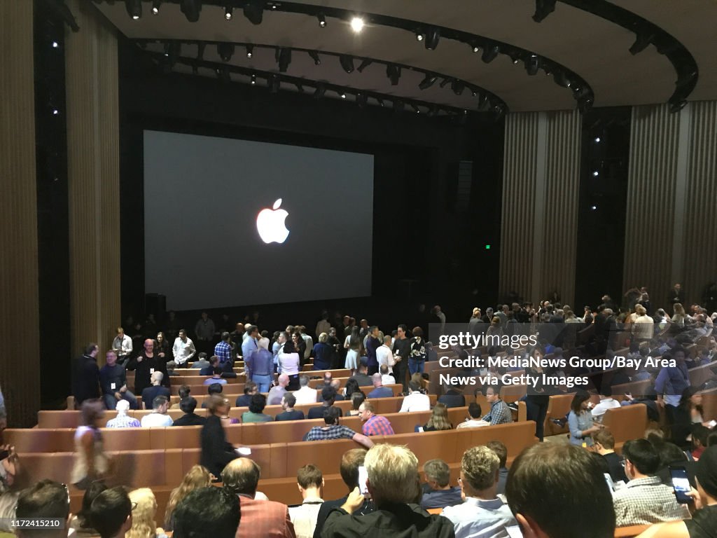 Tech journalists gather at the Steve Jobs Theater before the first-ever product launch at the new Apple Campus in Cupertino on Tuesday.   (Seung Lee/Bay Area News Group)