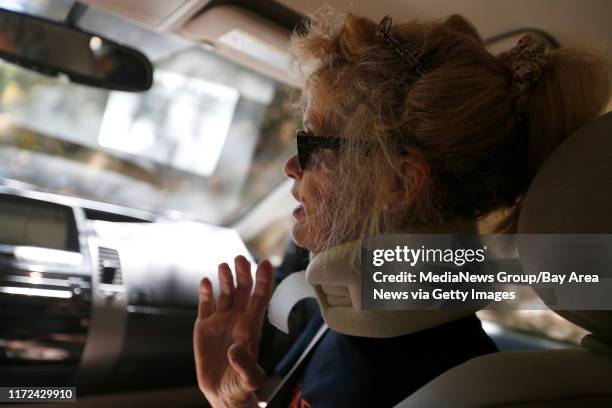 Paula Thompson is driven home by a volunteer from the Get Up & Go paratransit service after a physical therapy appoint on Tuesday, July 11 in San...