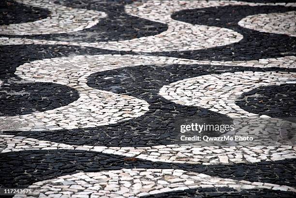 manaus sidewalk pattern – a symbol for racial harmony - portugees straatmozaïek stockfoto's en -beelden