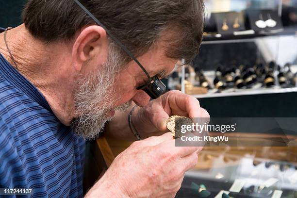 the appraiser - jeweller stock pictures, royalty-free photos & images