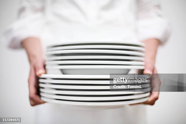 place setting - stack of plates stock pictures, royalty-free photos & images