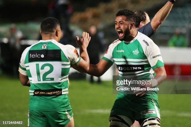 Sione Tu’ipulotu of Manawatu celebrates the win with Ngani Laumape during the round 5 Mitre 10 Cup match between Manawatu and Northland at Central...