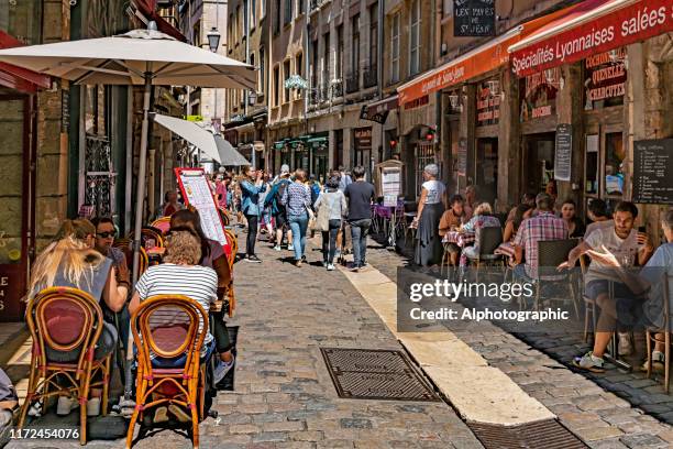 french sidewalk cafes in lyon - lyon restaurants stock pictures, royalty-free photos & images