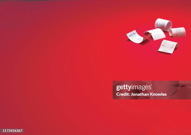 receipts on red background - receipt bildbanksfoton och bilder