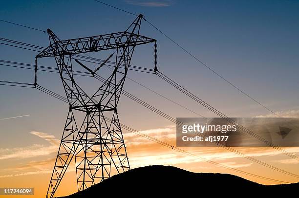 power lines - telegraph machine stock-fotos und bilder