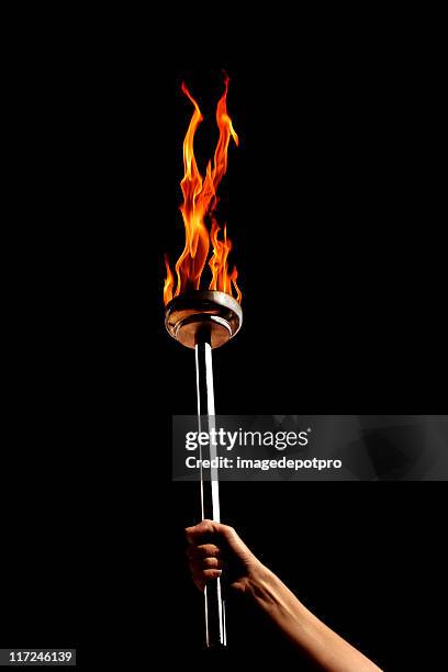 flaming fackel - fackel stock-fotos und bilder