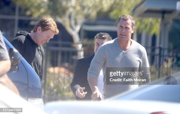 Wayne Carey and Cameron Ling are seen arriving at Perth Airport on September 5, 2019 in Perth, Australia.