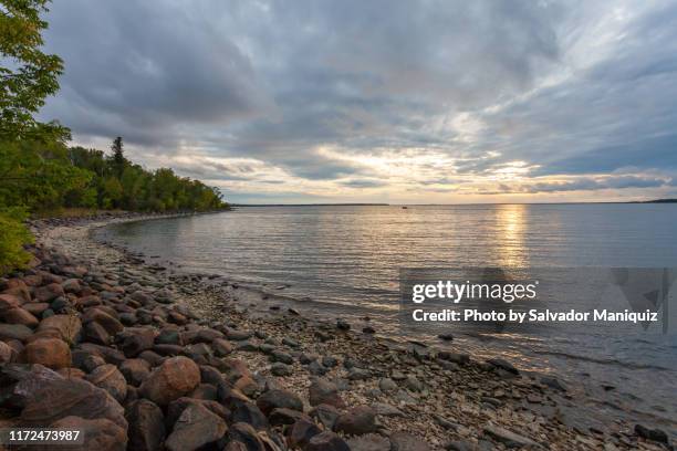 sunset beach in hecla provincial park - winnipeg park stock pictures, royalty-free photos & images