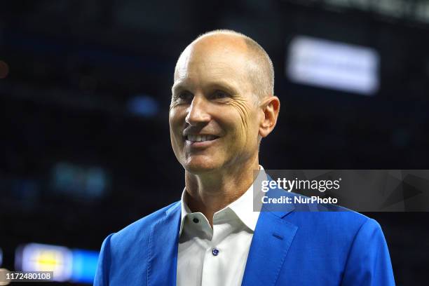 Former Detroit Lions kicker Jason Hanson walks off the field after being recognized during halftime of an NFL football game against the Kansas City...