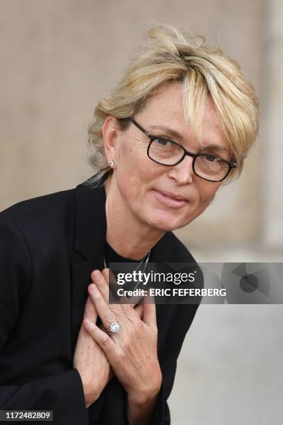 Claude Chirac, the daughter of France's former President Jacques Chirac, thanks the members of the public as she arrives to attend a church service...