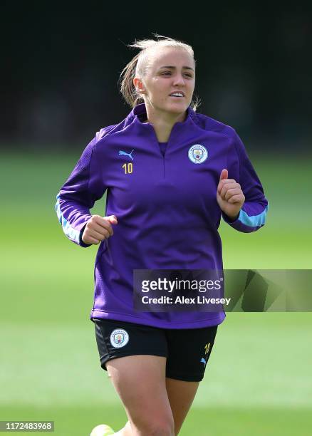 Georgia Stanway of Manchester City Women warms up during a training session at Manchester City Football Academy on September 05, 2019 in Manchester,...