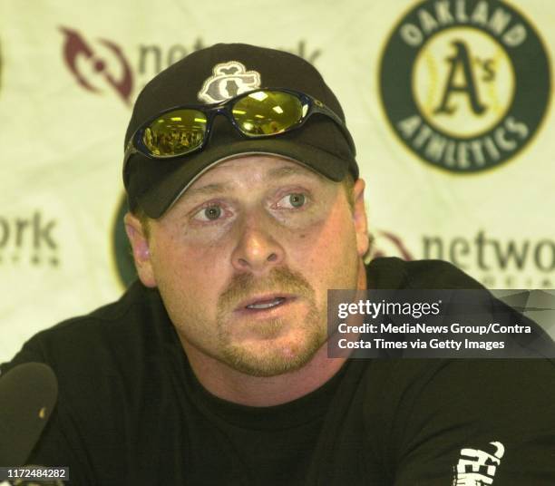 Former Oakland Athletics Jeremy Giambi talks about being traded to Philadelphia at a press conference during the A's game against the Baltimore...