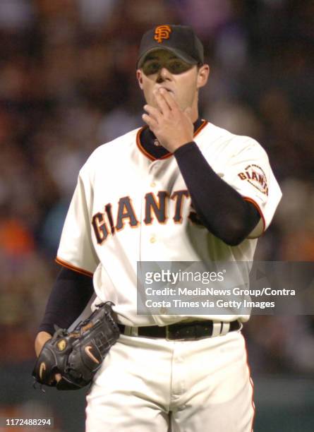 San Francisco Giants pitcher Noah Lowry reacts after hitting Washington National Robert Fick in the 5th inning during their baseball game in San...