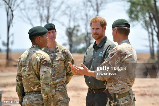 Prince Harry, Duke of Sussex meets British soldiers at the memorial site for Guardsman Mathew Talbot of the Coldstream Guards at the Liwonde National...