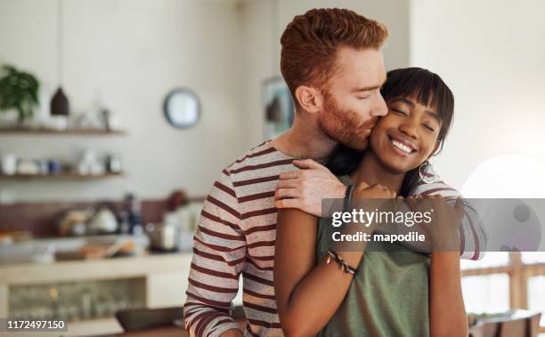 deine liebe gibt mir gänsehaut - black men kissing white women stock-fotos und bilder