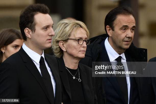 France's former President Jacques Chirac's daughter Claude Chirac arrives with her son Martin Rey-Chirac and her husband Frederic Salat-Baroux to...