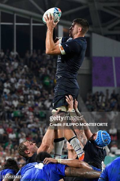 Scotland's flanker Magnus Bradbury catches the ball in a line out during the Japan 2019 Rugby World Cup Pool A match between Scotland and Samoa at...