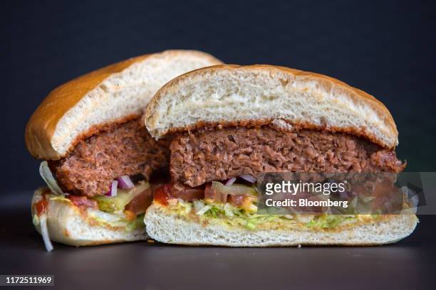 Cross section of a 'beyond burger' displays the Beyond Meat Inc. Plant-based burger patty inside a TGI Friday's Inc. Restaurant in Moscow, Russia, on...