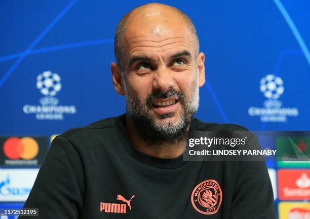 Manchester City's Spanish manager Pep Guardiola attends a press conference at City Football Academy in Manchester, north west England on September 30...