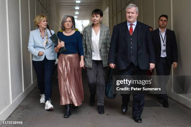Independent Group for Change Anna Soubry, Plaid Cymru MP Liz Saville-Roberts, Green Party MP Caroline Lucas and SNP MP Ian Blackford arrive for cross...